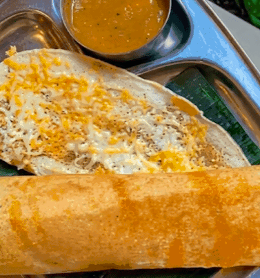 Vimala's Curryblossom Cafe signature dishes Chicken Curry
Mysore Masala Dosa
Garlic Naan